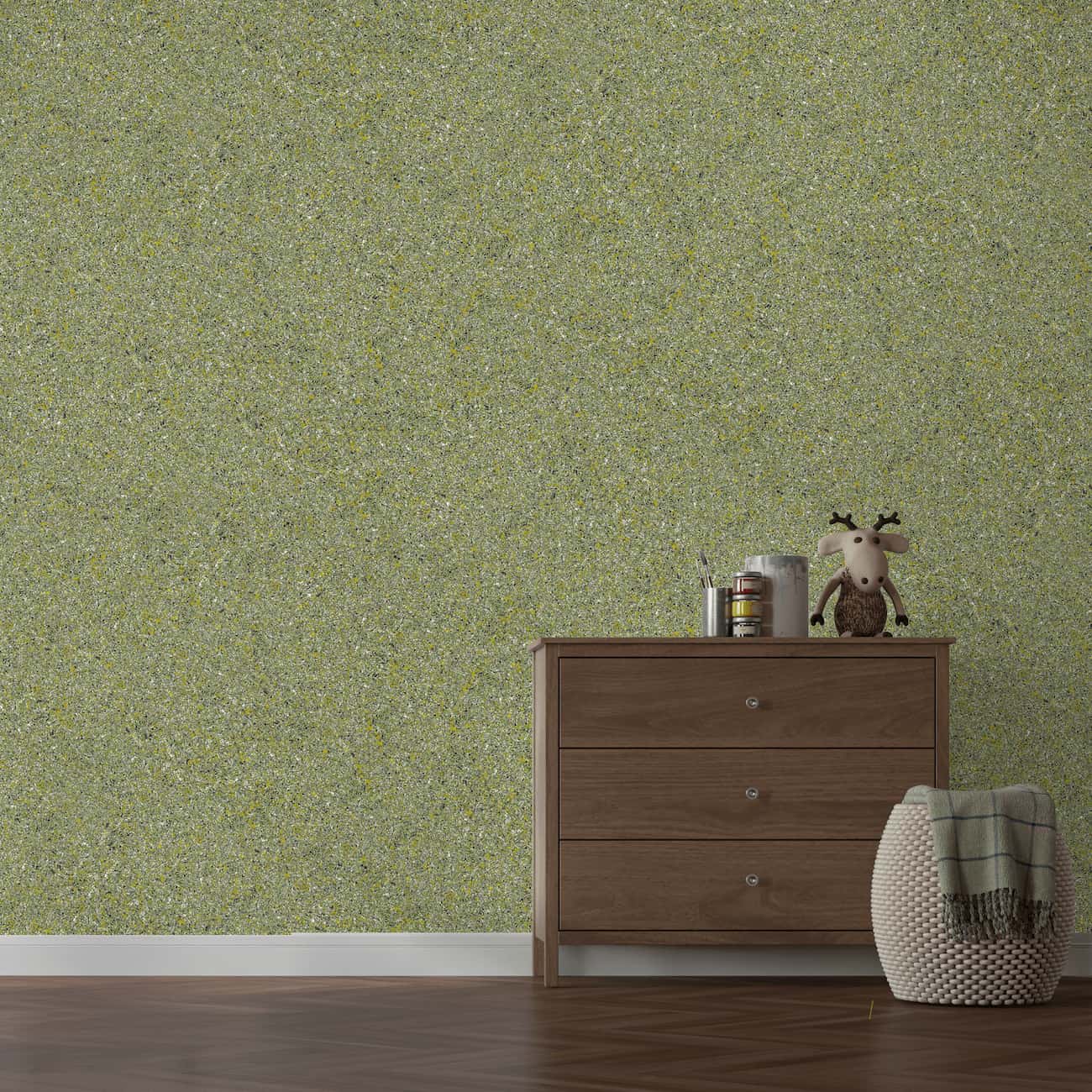 Perete decorat cu tapet Belka autoadeziv, de culoare verde măsliniu, într-o cameră cu mobilier de lemn și jucării.